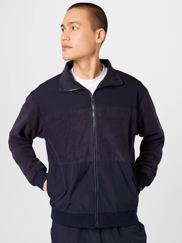 Mennace Between-Season Jacket in Blue: front