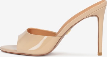 Kazar Mules in Beige: front