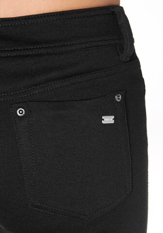 LAURA SCOTT Skinny Pants in Black