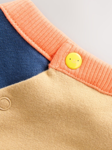 Tutina / body per bambino di Next in beige