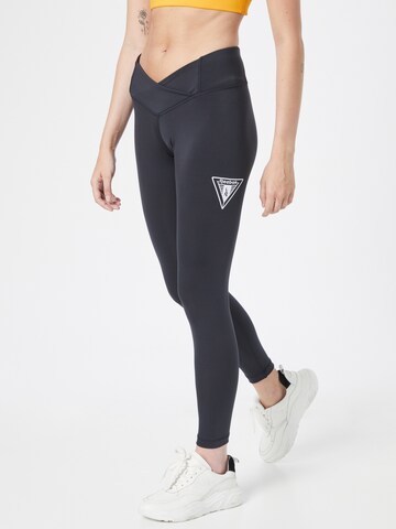 Reebok Skinny Workout Pants in Black: front