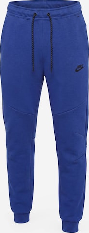 Nike SportswearTapered Hlače 'Tech Fleece' - plava boja: prednji dio