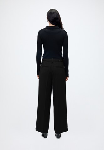 Wide leg Pantaloni cu dungă de la Calvin Klein Jeans pe negru