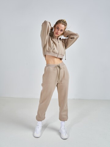 ABOUT YOU x Swalina&Linus Loose fit Pants 'Luisa' in Beige: front