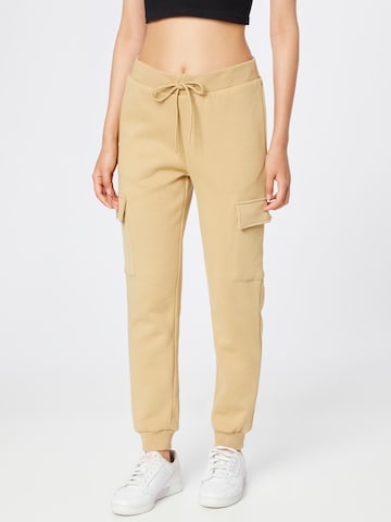 Urban Classics Tapered Cargo Pants in Beige: front