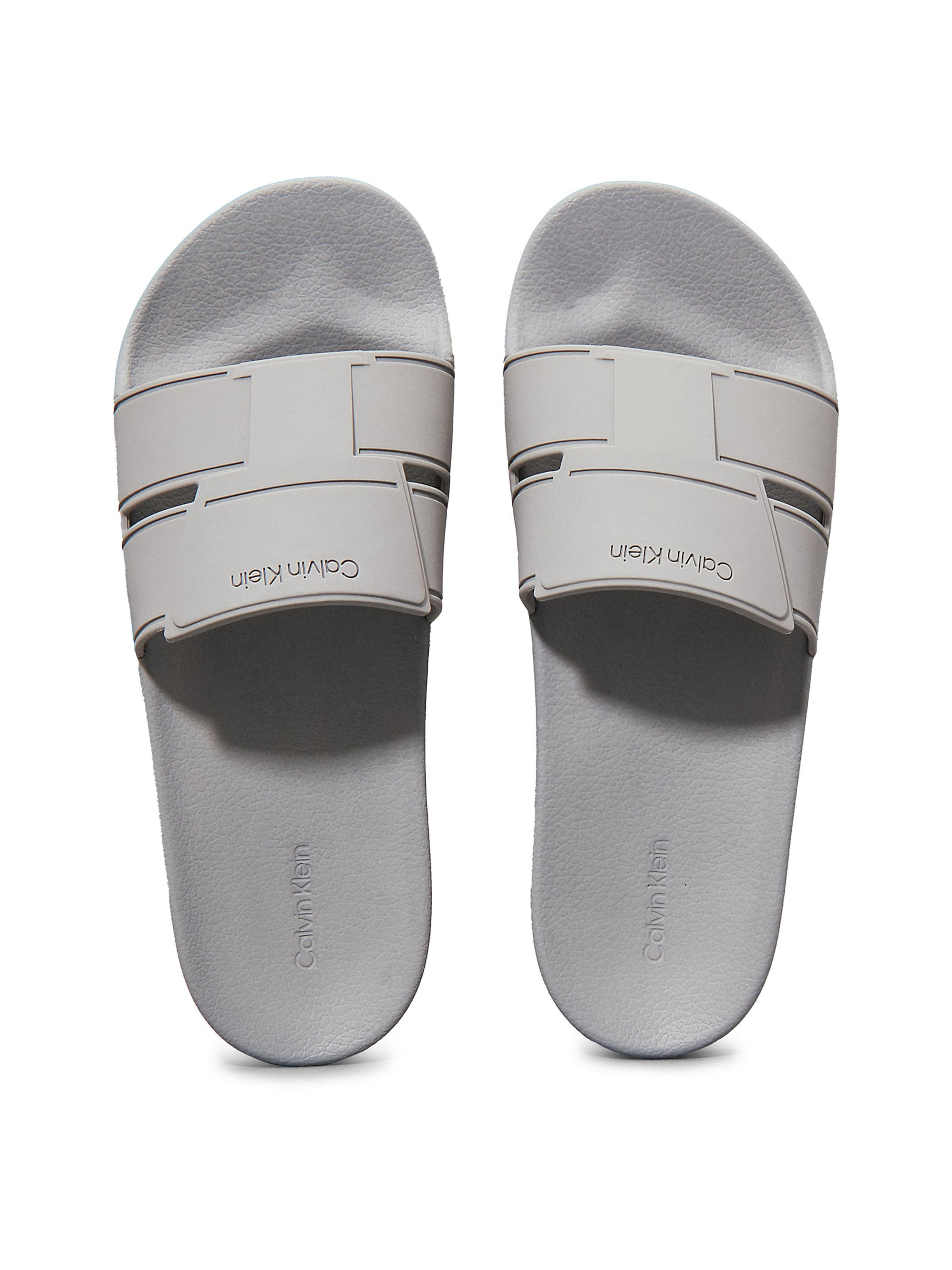 Calvin Klein Mules in Grey