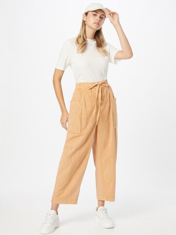 Free People Loosefit Hose 'BE THE CHANGE' in Orange