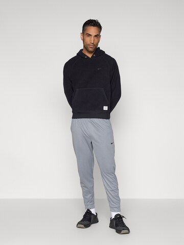 NIKE Sport szabadidős felsők - fekete