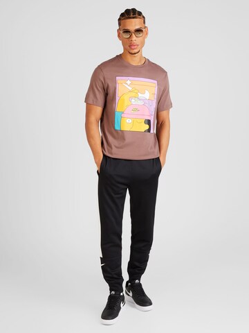 Nike Sportswear - Camiseta en lila