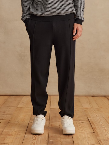 DAN FOX APPAREL Tapered Trousers 'Marius' in Black: front