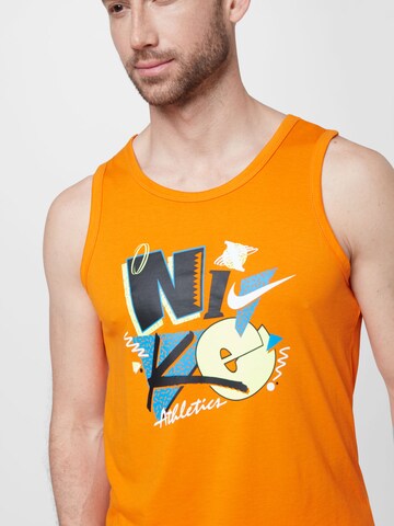 Tricou funcțional de la NIKE pe portocaliu