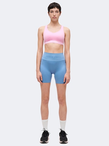 Bustier Soutien-gorge de sport 'INDY' NIKE en rose