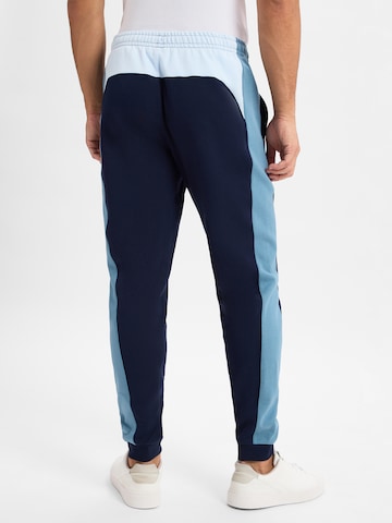 LACOSTE Slim fit Trousers in Blue