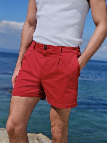 Next - regular Pantalón plisado en rojo