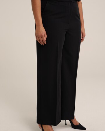 WE Fashion Wide leg Trousers with creases in Black: front