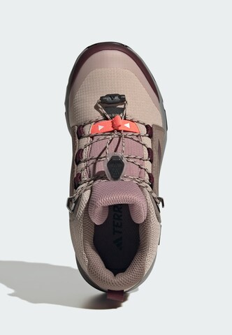 ADIDAS TERREX - Botas em roxo