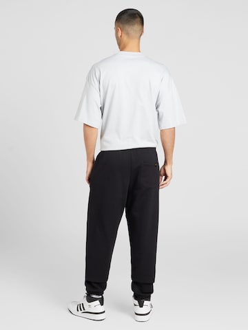 ALPHA INDUSTRIES Tapered Trousers 'Essentials' in Black