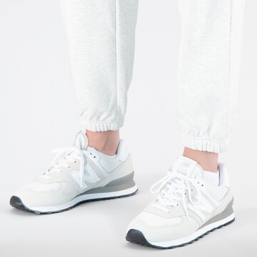 new balance Tapered Sporthose in Weiß