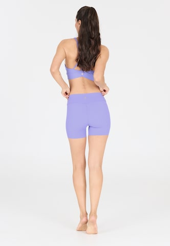 Athlecia Slim fit Leggings in Purple