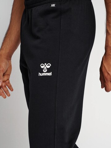 Regular Pantalon de sport 'Core XK' Hummel en noir