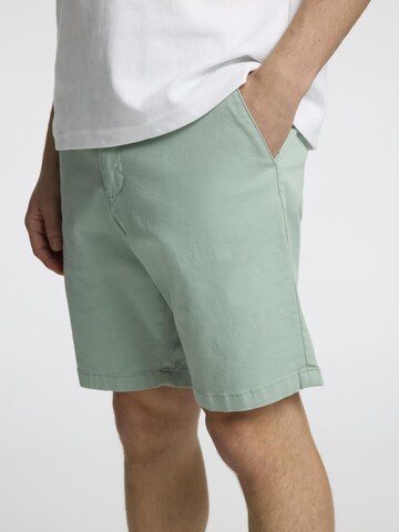 Coupe slim Pantalon 'SLHMiles' SELECTED en vert