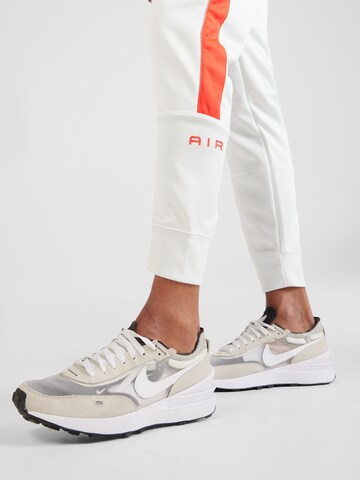 Nike Sportswear Zúžený Kalhoty 'AIR' – bílá