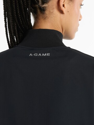 A-Game Spordijope 'Oversized Track Jacket', värv must