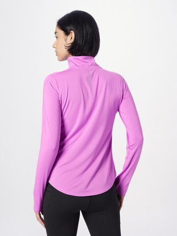 new balance - Camisa funcionais 'Accelerate' em rosa