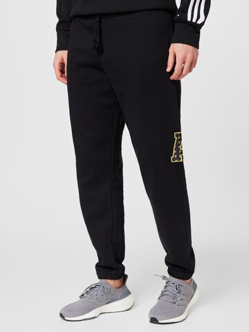 ADIDAS SPORTSWEAR Tapered Workout Pants 'All Szn X Logomania' in Black: front