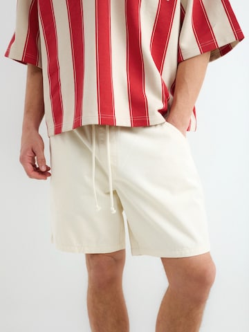 BALMOHK Loosefit Housut värissä beige