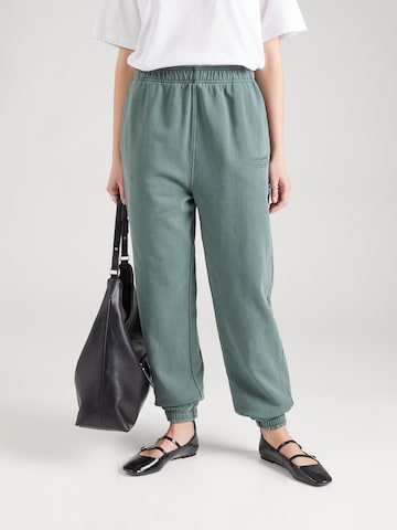 TOPSHOP Zúžený strih Nohavice - Zelená: predná strana