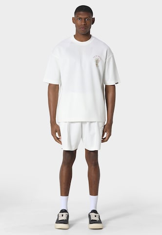 T-Shirt 'Pot De Vie' Pas De Monaco en blanc
