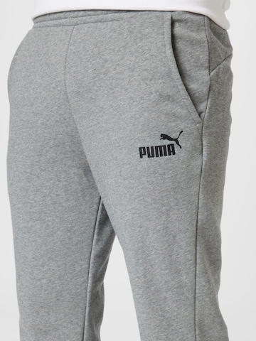 PUMA Regular Workout Pants 'Essentials' in Grey