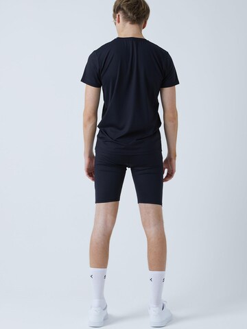 Skinny Leggings 'Short Tights mit Taschen' SPORTKIND en noir