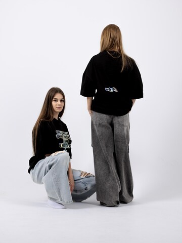BTY Oversized tričko 'Unisex Oversized T-shirt' – černá: přední strana
