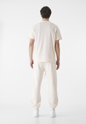 Loosefit Pantaloni di 9N1M SENSE in rosa