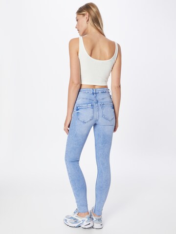 River Island - Skinny Calças de ganga em azul