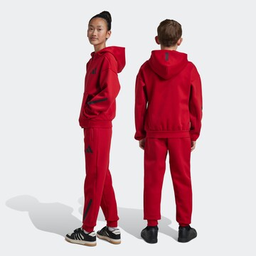 ADIDAS SPORTSWEAR Tapered Workout Pants 'Z.N.E.' in Red