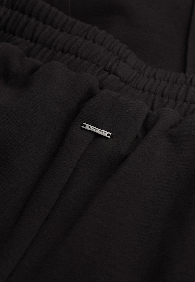 Superdry Pantalon en noir / blanc, Vue avec produit