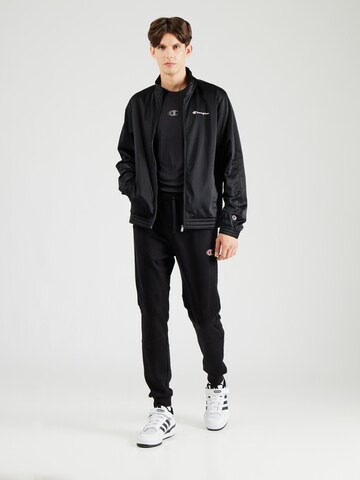 Champion Authentic Athletic Apparel Tapered Sporthose in Schwarz
