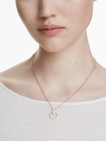 Swarovski - Cadena en oro: frente