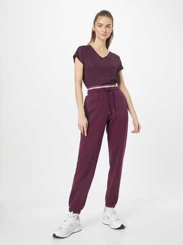 BJÖRN BORG Tapered Sportbroek in Lila