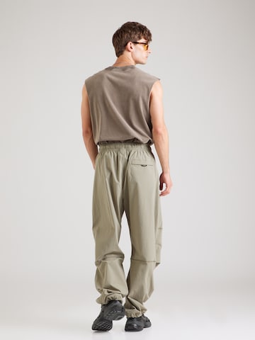 Nike Sportswear Конический (Tapered) Штаны 'Tech' в Зеленый