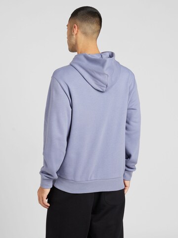 Champion Authentic Athletic Apparel Sweatshirt i blå