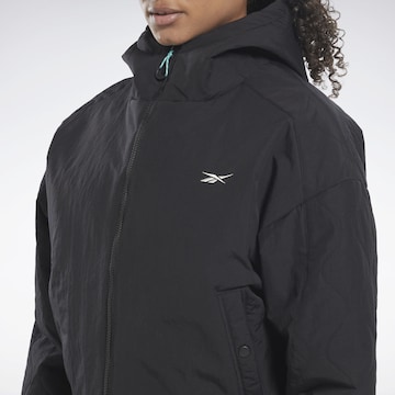 Reebok Športna jakna | črna barva
