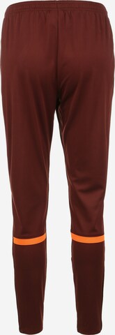 NIKE Skinny Workout Pants in Brown