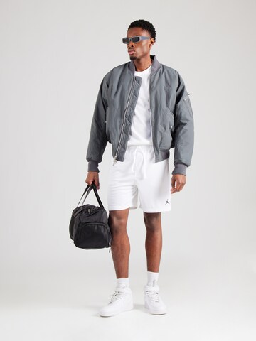 T-Shirt fonctionnel Jordan en blanc