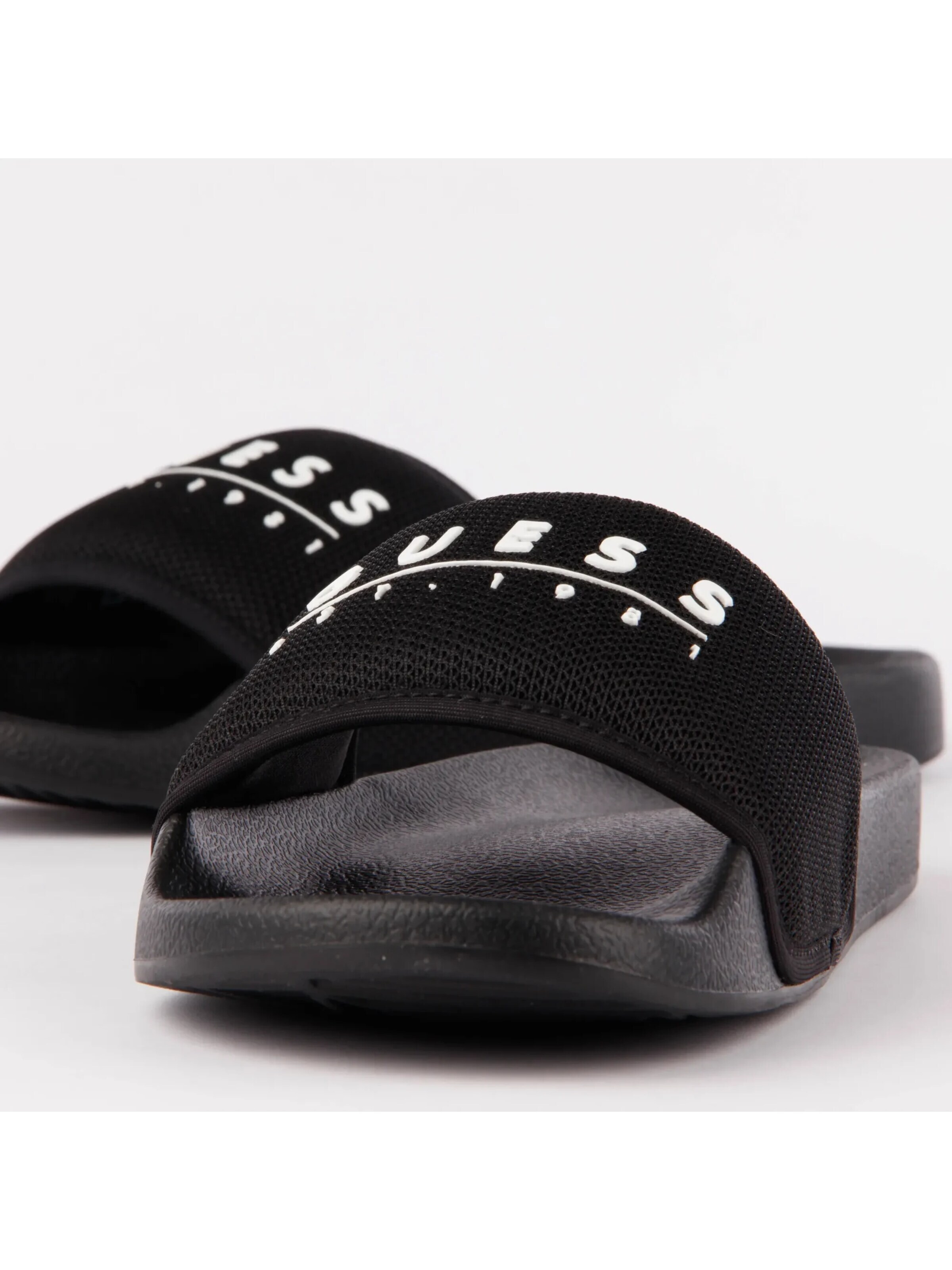 Zoccoletto 'Tokyom' di GUESS in nero