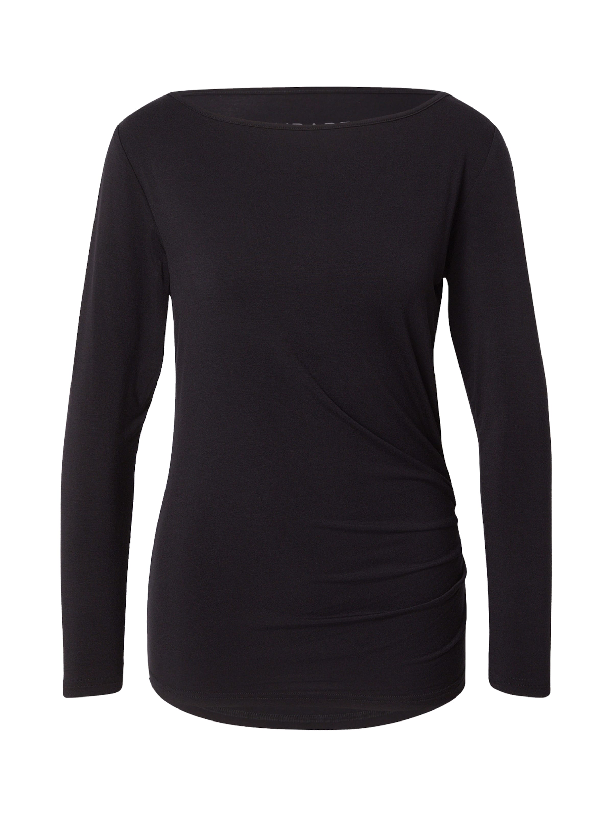 CURARE Yogawear Funktionsshirt in Schwarz: Vorderseite