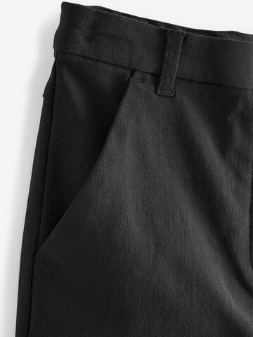 Next Skinny Hose 'Senior Gold Snap' in Schwarz